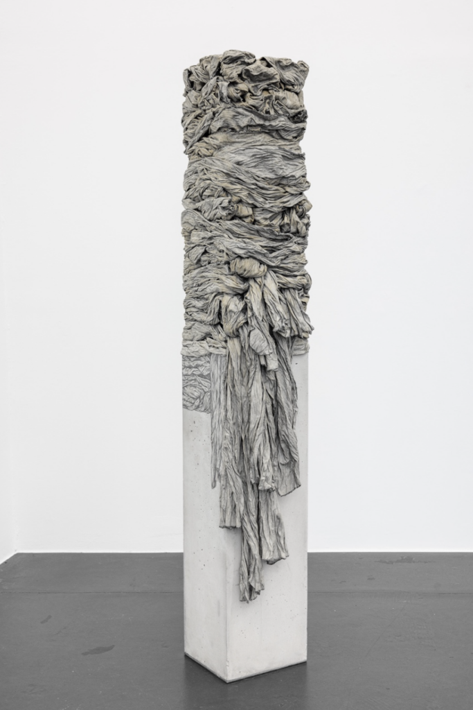 Blurred line 3, 2022, concrete, steel, fabric, glue and pencil, ca. 162 x 50 x 50