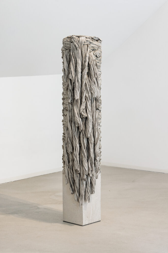 dignity 3, 2023, concrete, steel, fabric and glue, ca. 130 x 25 x 39